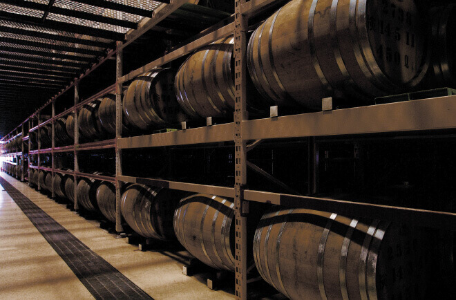 Aging in oak barrels produces the rich flavor and taste